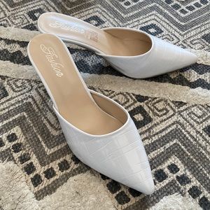 Pointed toe mules